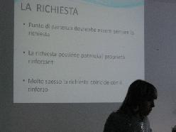 La dott.ssa Nocera con una diapositiva sulla richiesta nella CAA
